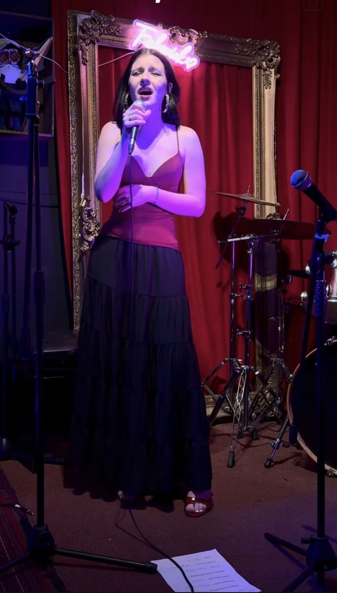 Kamila performing her first public gig