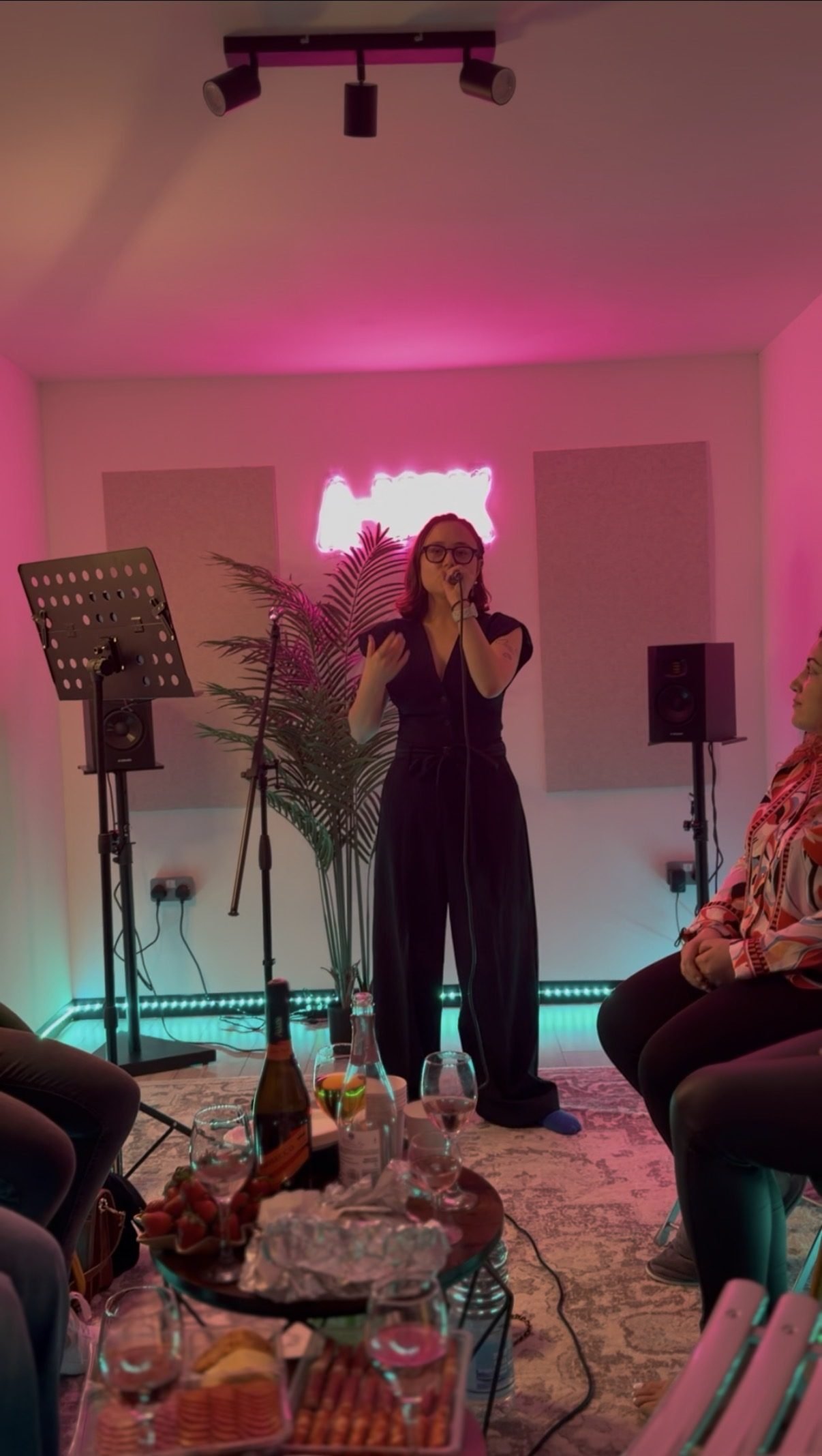 A student performing at the A-VOX studio open mic evening