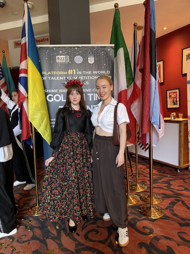 Arseniia with her coach at the Golden Time Talent festival in London